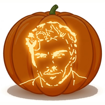 The finished design shown lit on a pumpkin